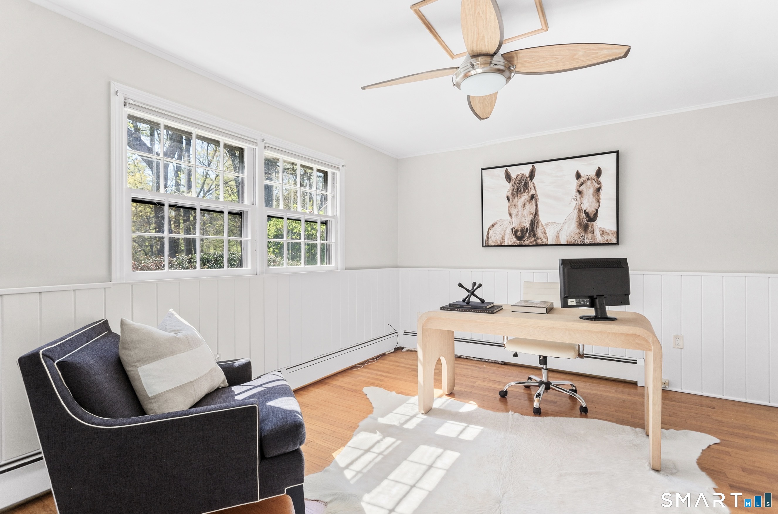 24 Burr School Road Westport, CT 06880 - Photo 22 of 40 5th bedroom on main floor or make it your own private office /study with a decorative bookcase wall