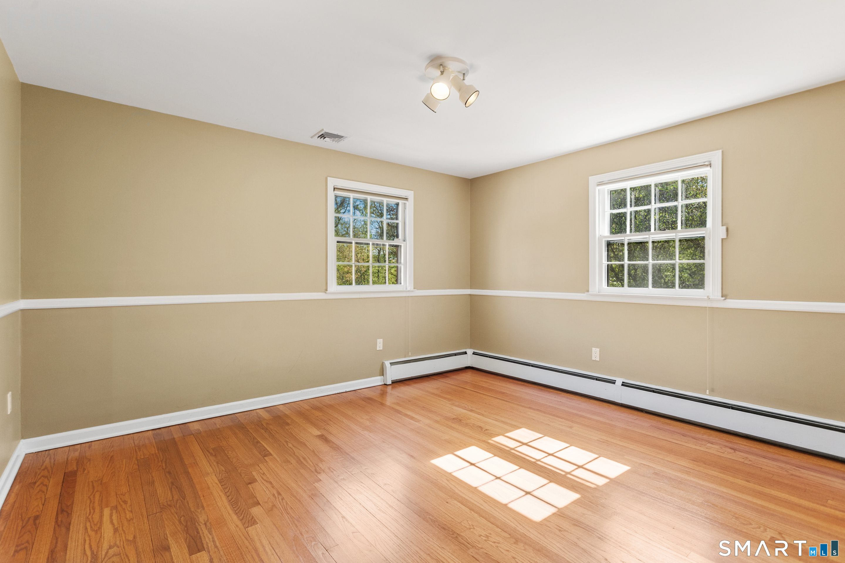 24 Burr School Road Westport, CT 06880 - Photo 32 of 40 Second floor Bedroom...sunny large space with moldings and closet with built-ins