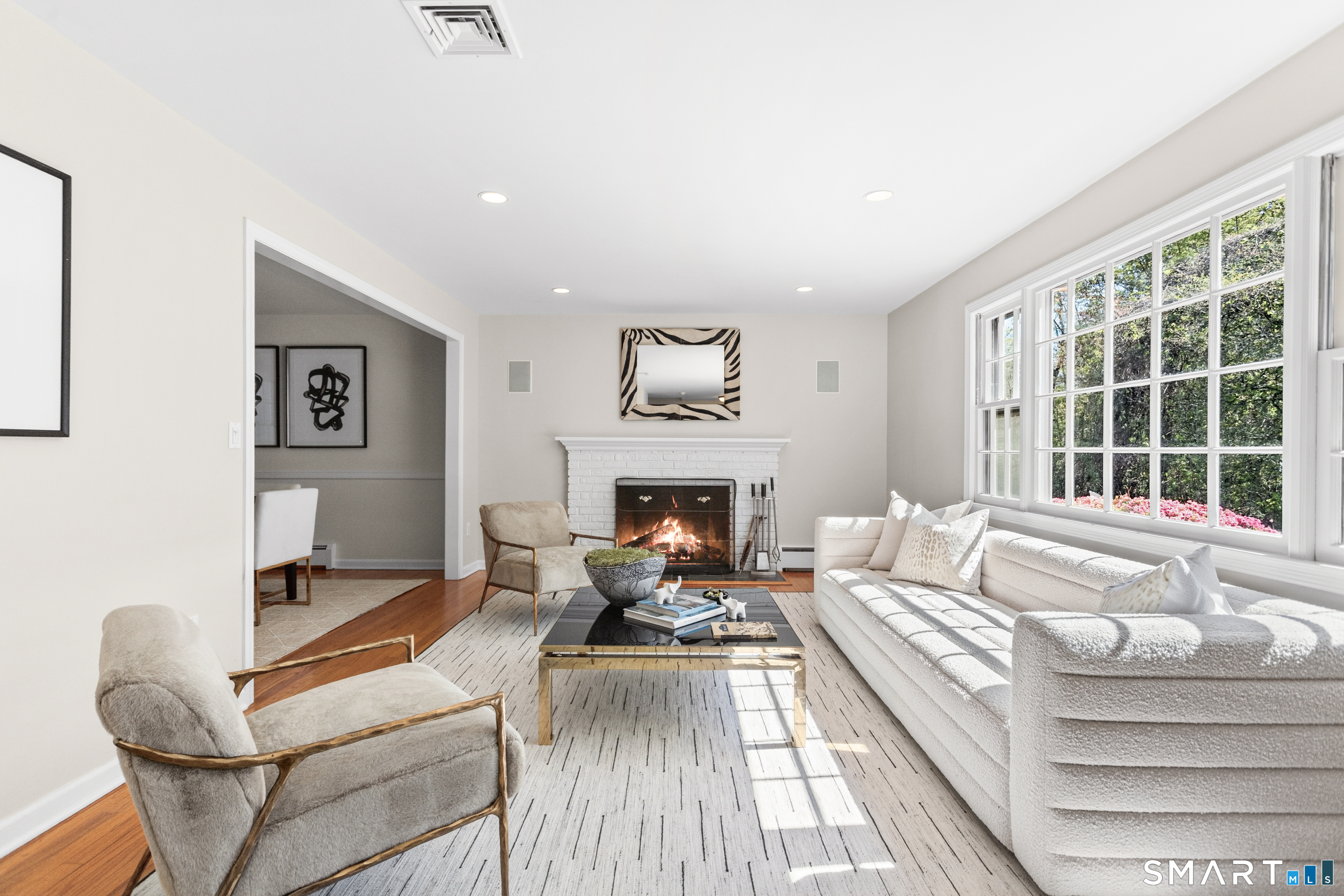 24 Burr School Road Westport, CT 06880 - Photo 9 of 40 Warm and welcoming living room with beautiful fireplace