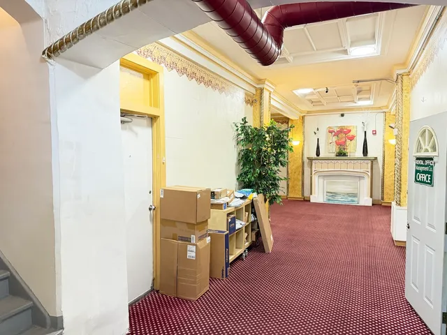 a view of a livingroom with furniture and front door