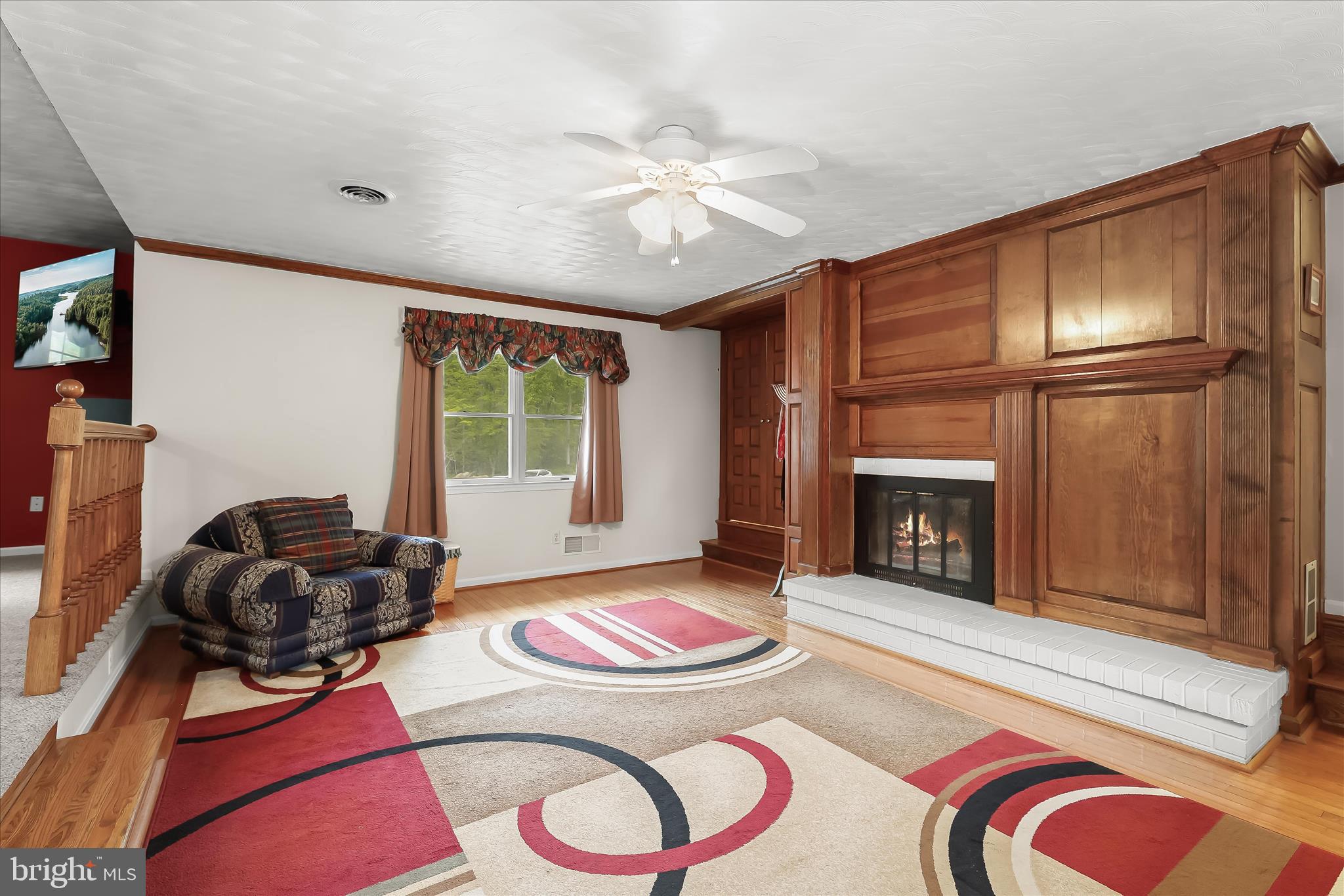 3754 Patuxent River Road Davidsonville, MD 21035 - Photo 28 of 82 a living room with furniture and a fireplace