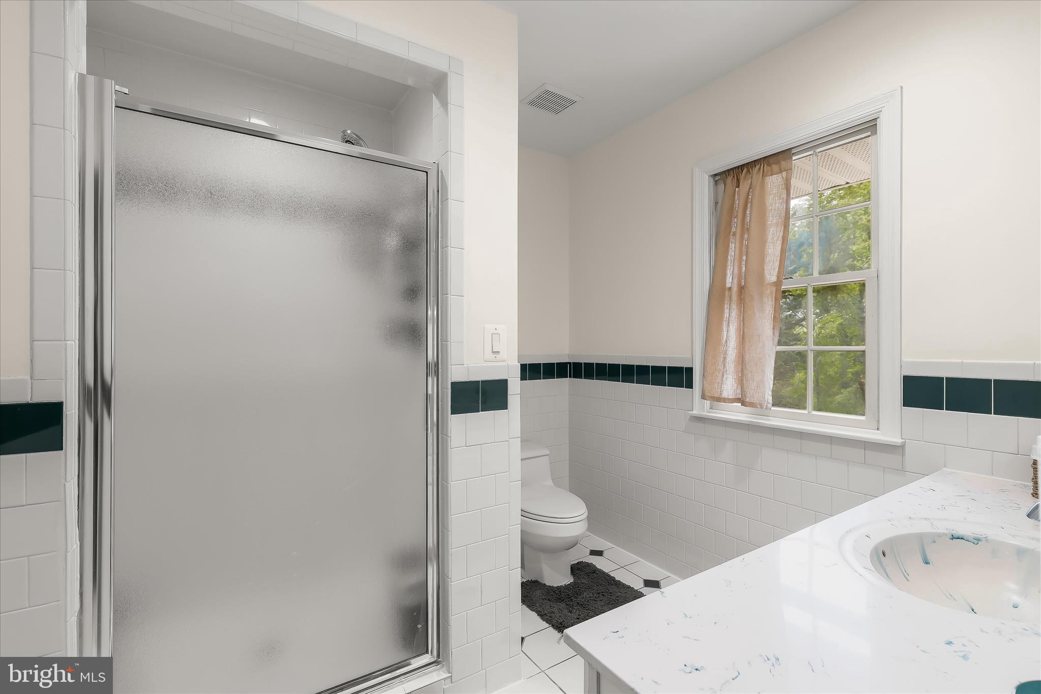 3754 Patuxent River Road Davidsonville, MD 21035 - Photo 38 of 82 a bathroom with a sink and a toilet
