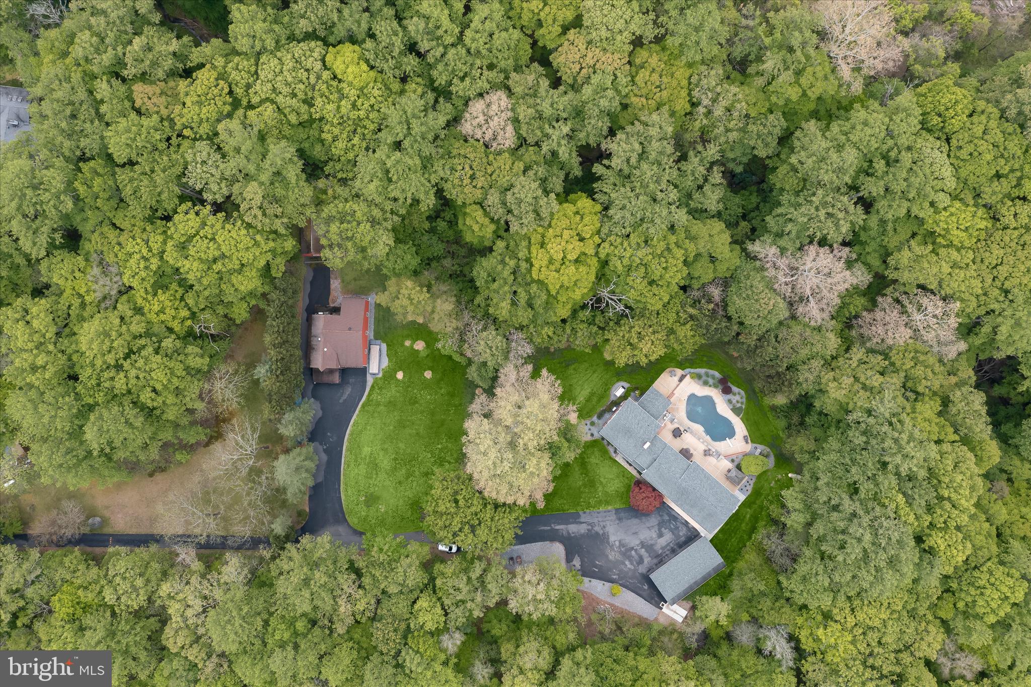 3754 Patuxent River Road Davidsonville, MD 21035 - Photo 57 of 82 an aerial view of a house with a yard and trees