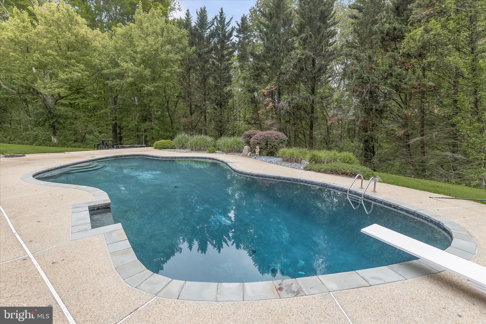 3754 Patuxent River Road Davidsonville, MD 21035 - Photo 61 of 82 a view of a swimming pool with a yard