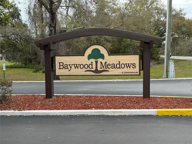 a sign that is on the side of a road