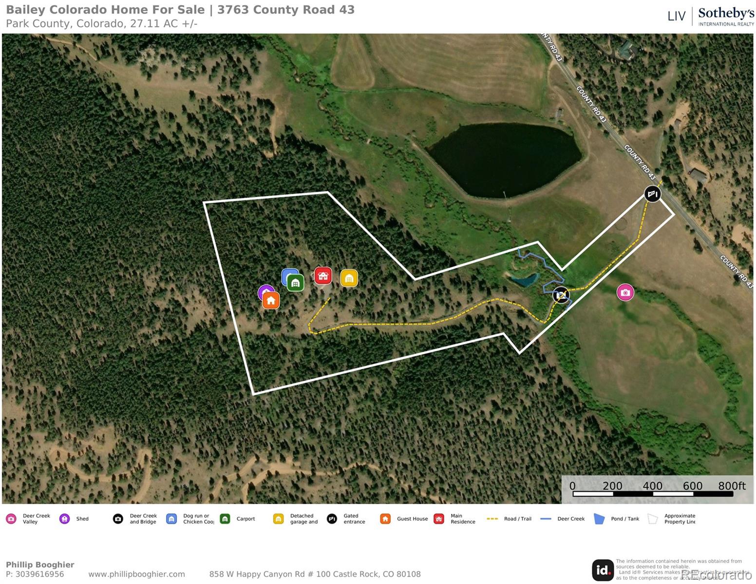 3763 County Road 43 Bailey, CO 80421 - Photo 37 of 40 a black and white photo of a book