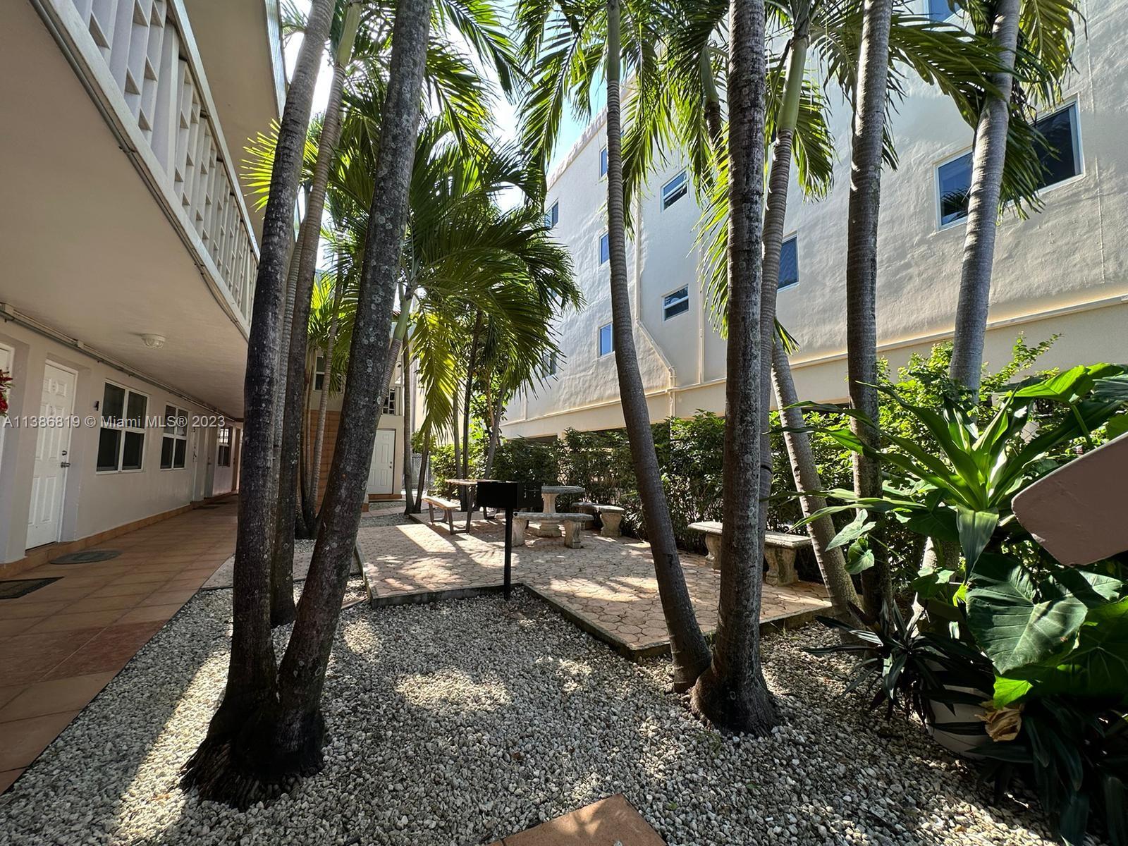 1740 Funston Street, Unit 12 Hollywood, FL 33020 - Photo 9 of 10 a view of outdoor space yard and porch