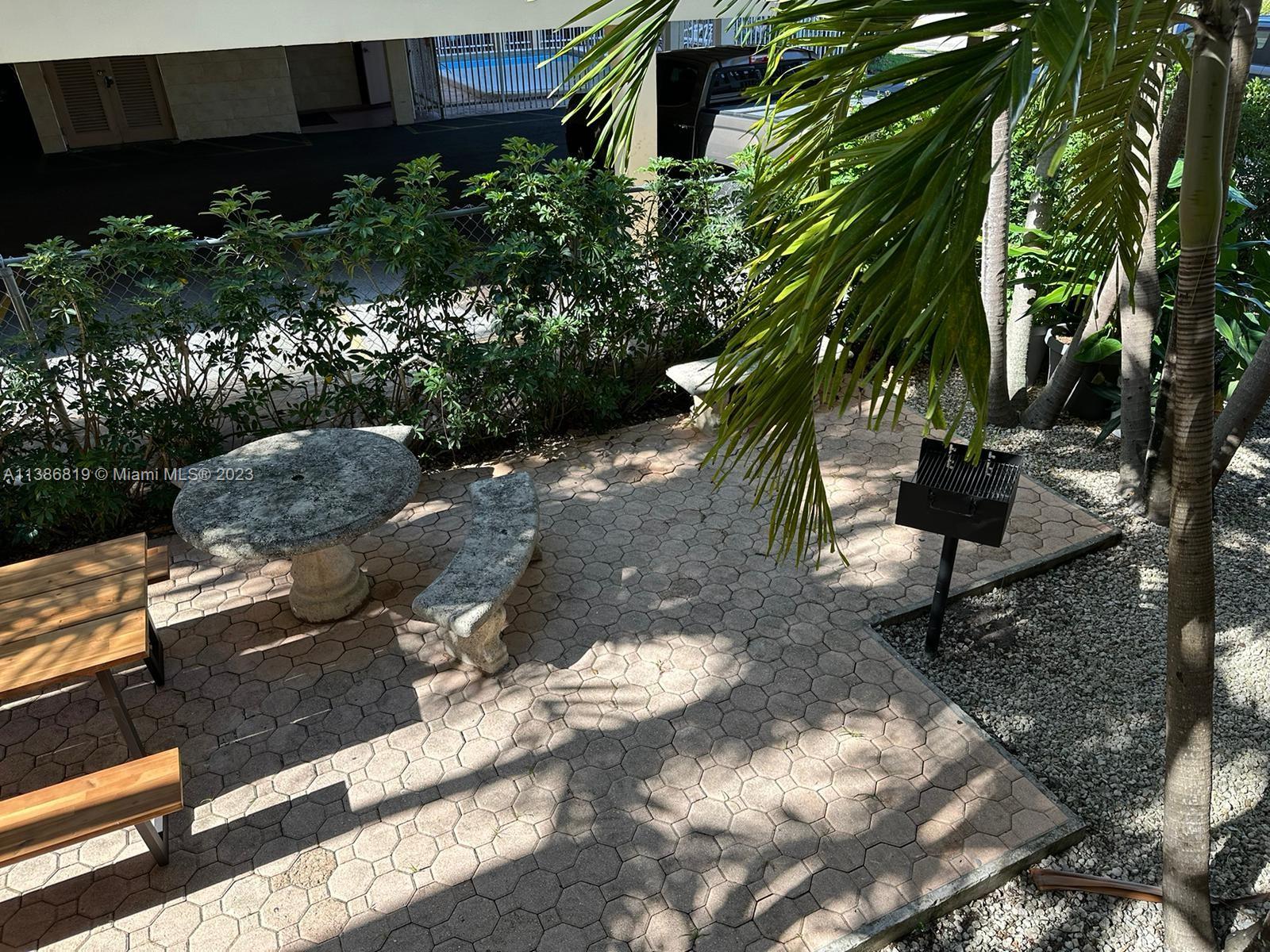 1740 Funston Street, Unit 12 Hollywood, FL 33020 - Photo 10 of 10 a view of a backyard of a house