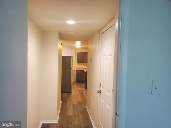 a view of a bathroom from the hallway