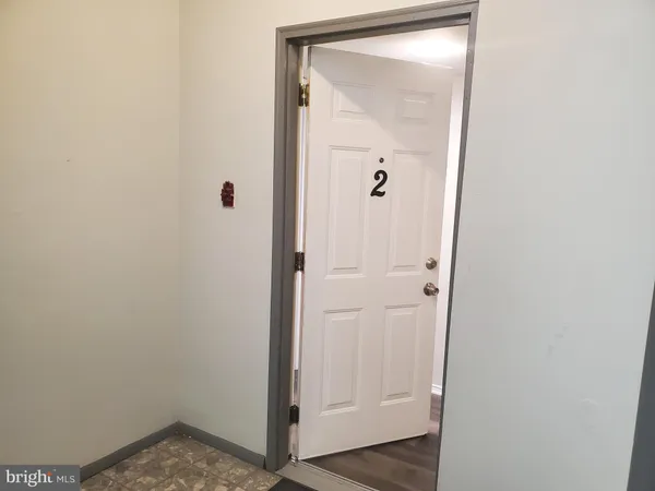 a view of a bathroom with a glass door