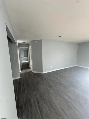 a kitchen with a refrigerator sink and stove