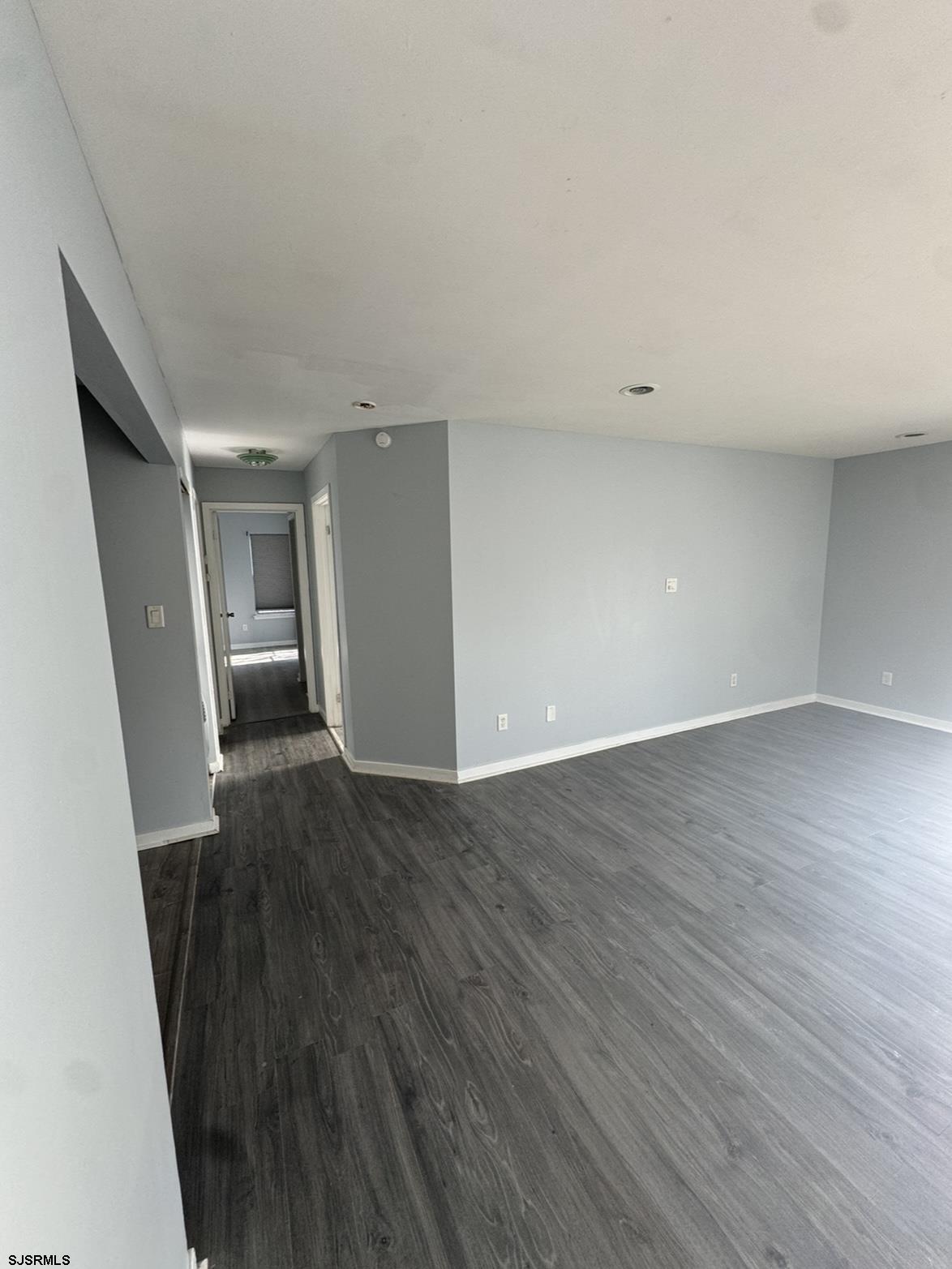 275 Heather Croft, Unit 275 Egg Harbor Township, NJ 08234 - Photo 11 of 23 a view of empty room with wooden floor