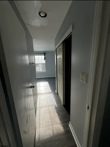 a view of an empty room and window