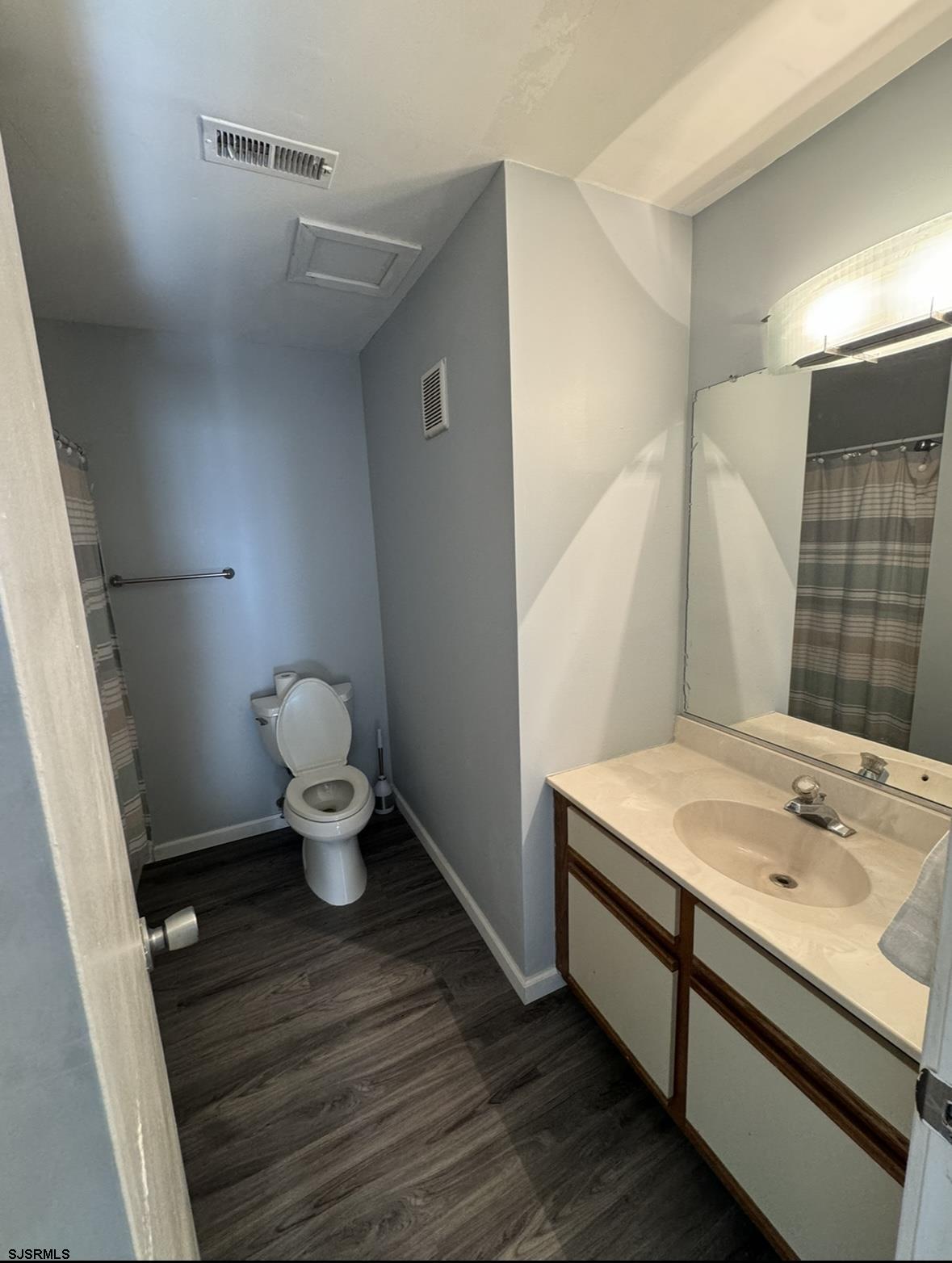 275 Heather Croft, Unit 275 Egg Harbor Township, NJ 08234 - Photo 19 of 23 a bathroom with a sink and a mirror