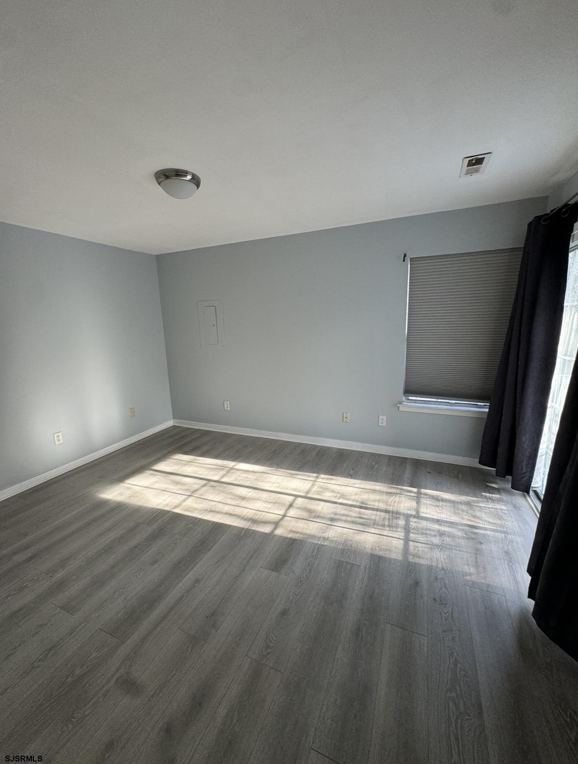 275 Heather Croft, Unit 275 Egg Harbor Township, NJ 08234 - Photo 20 of 23 a view of empty room with wooden floor