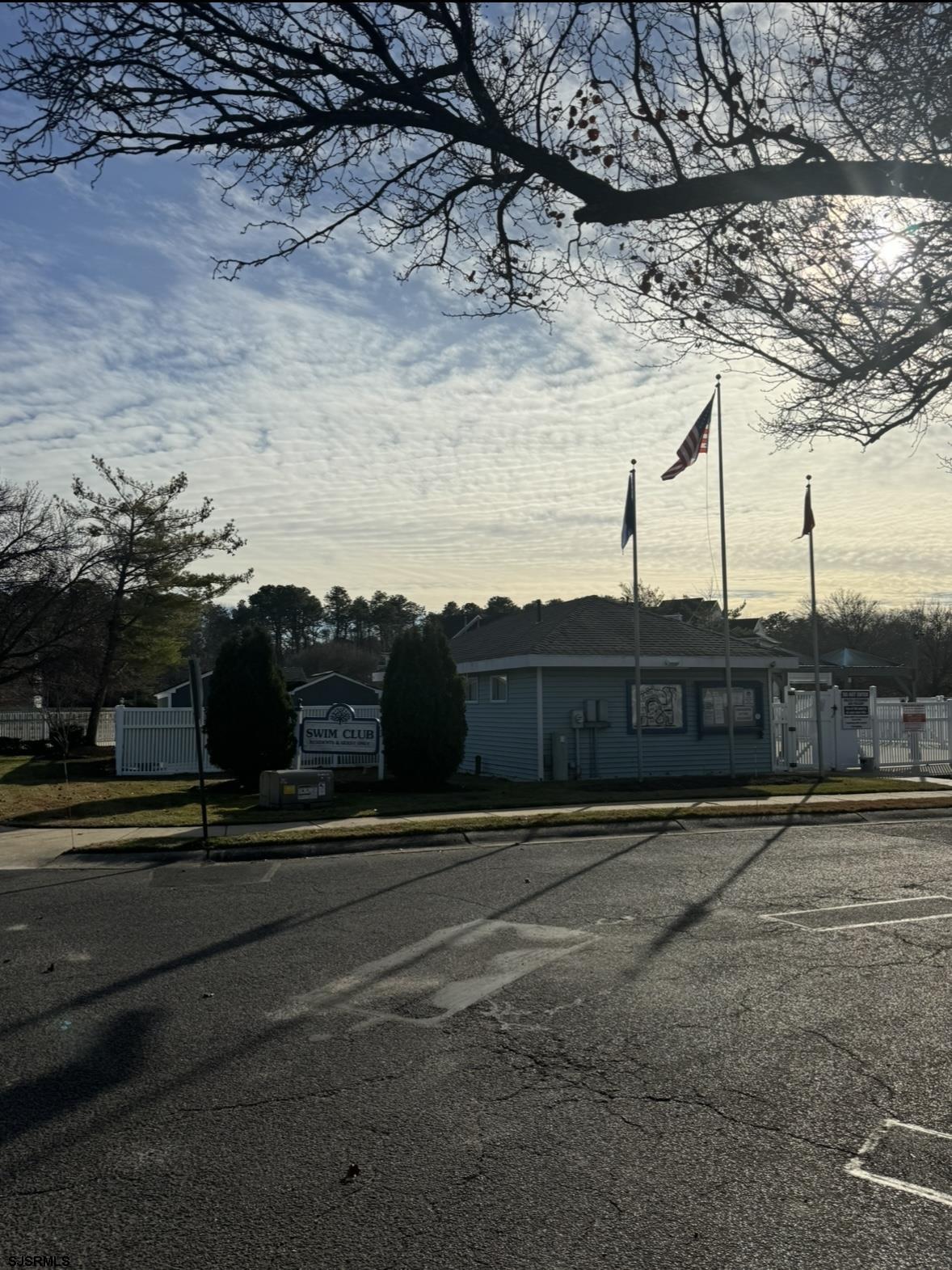 275 Heather Croft, Unit 275 Egg Harbor Township, NJ 08234 - Photo 4 of 23 a view of pathway with a building in the background