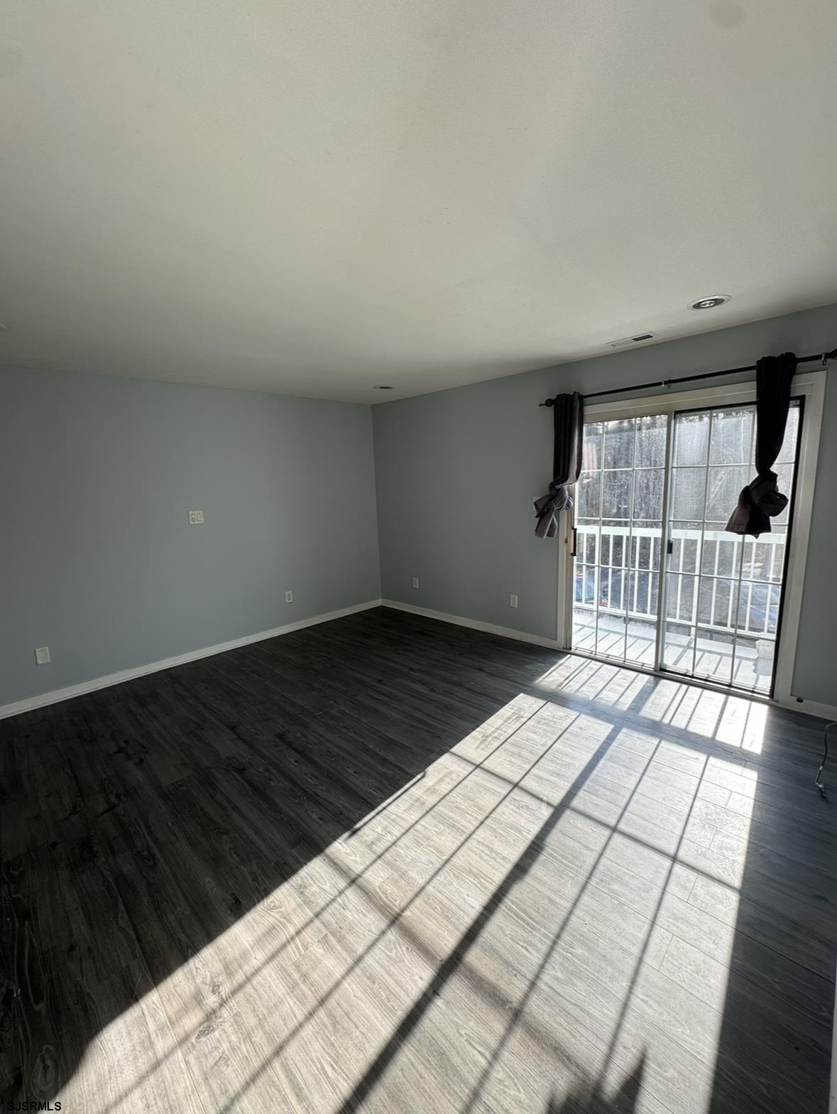 275 Heather Croft, Unit 275 Egg Harbor Township, NJ 08234 - Photo 9 of 23 a view of empty room with wooden floor