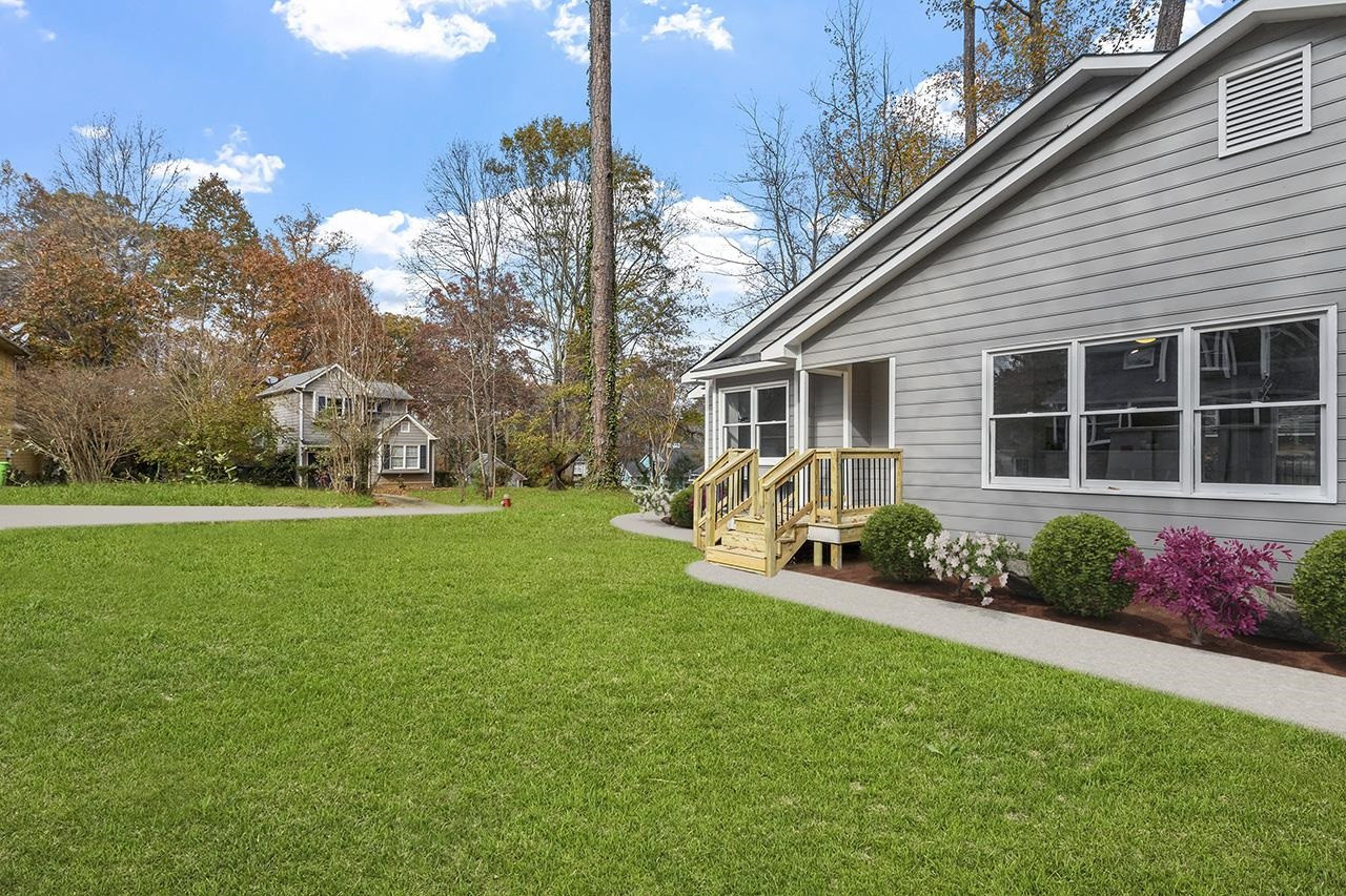 2316 Calvert Drive Raleigh, NC 27610 - Photo 33 of 34 a view of house with backyard and garden