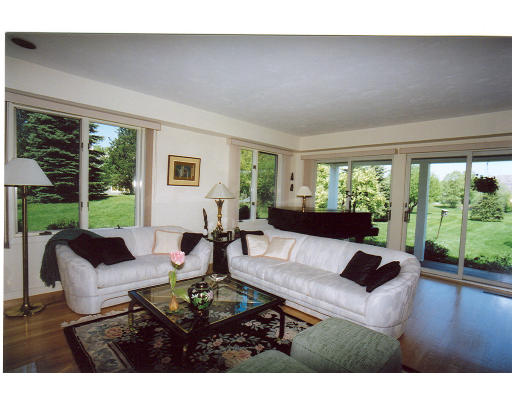 232 Tower Road Lincoln, MA 01773 - Photo 3 of 7 a living room with furniture and a large window