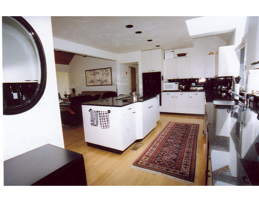 232 Tower Road Lincoln, MA 01773 - Photo 6 of 7 a living room with stainless steel appliances furniture and a rug