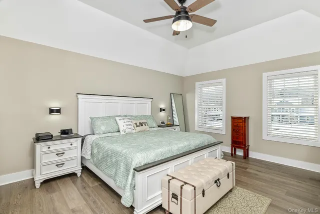 a bedroom with a bed and a table