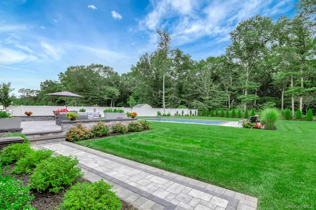 a view of a garden with houses