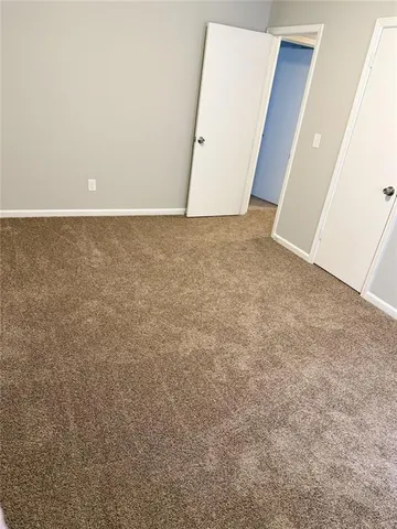 an empty room with an entryway
