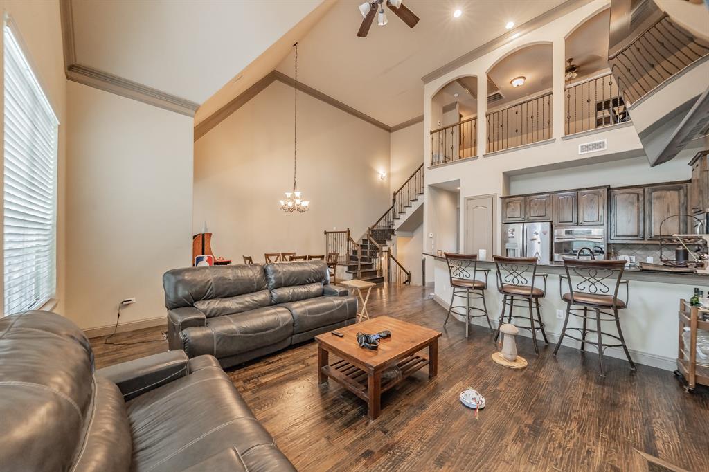 575 Rockingham Drive Irving, TX 75063 - Photo 15 of 38 a living room with furniture and a wooden floor