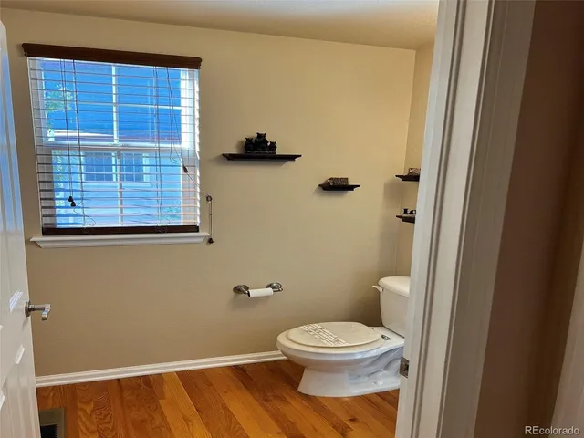 a bathroom with a toilet and a sink