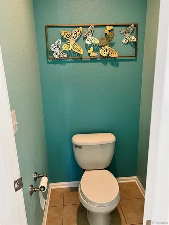 a bathroom with a toilet and a sink