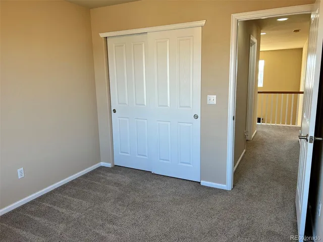 an empty room with a door