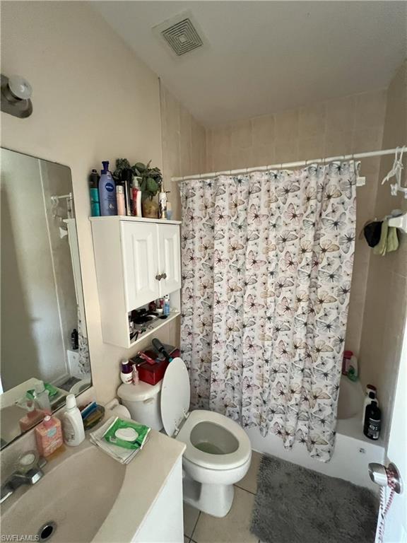 1716 48th Street Southwest Naples, FL 34116 - Photo 20 of 23 a bathroom with a sink toilet and shower
