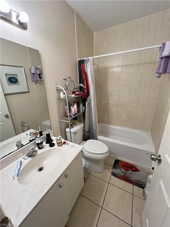 1716 48th Street Southwest Naples, FL 34116 - Photo 8 of 23 a bathroom with a sink toilet and shower