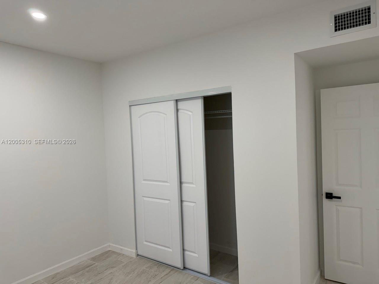2335 Northwest 68th Street Miami, FL 33147 - Photo 10 of 19 a view of an empty room