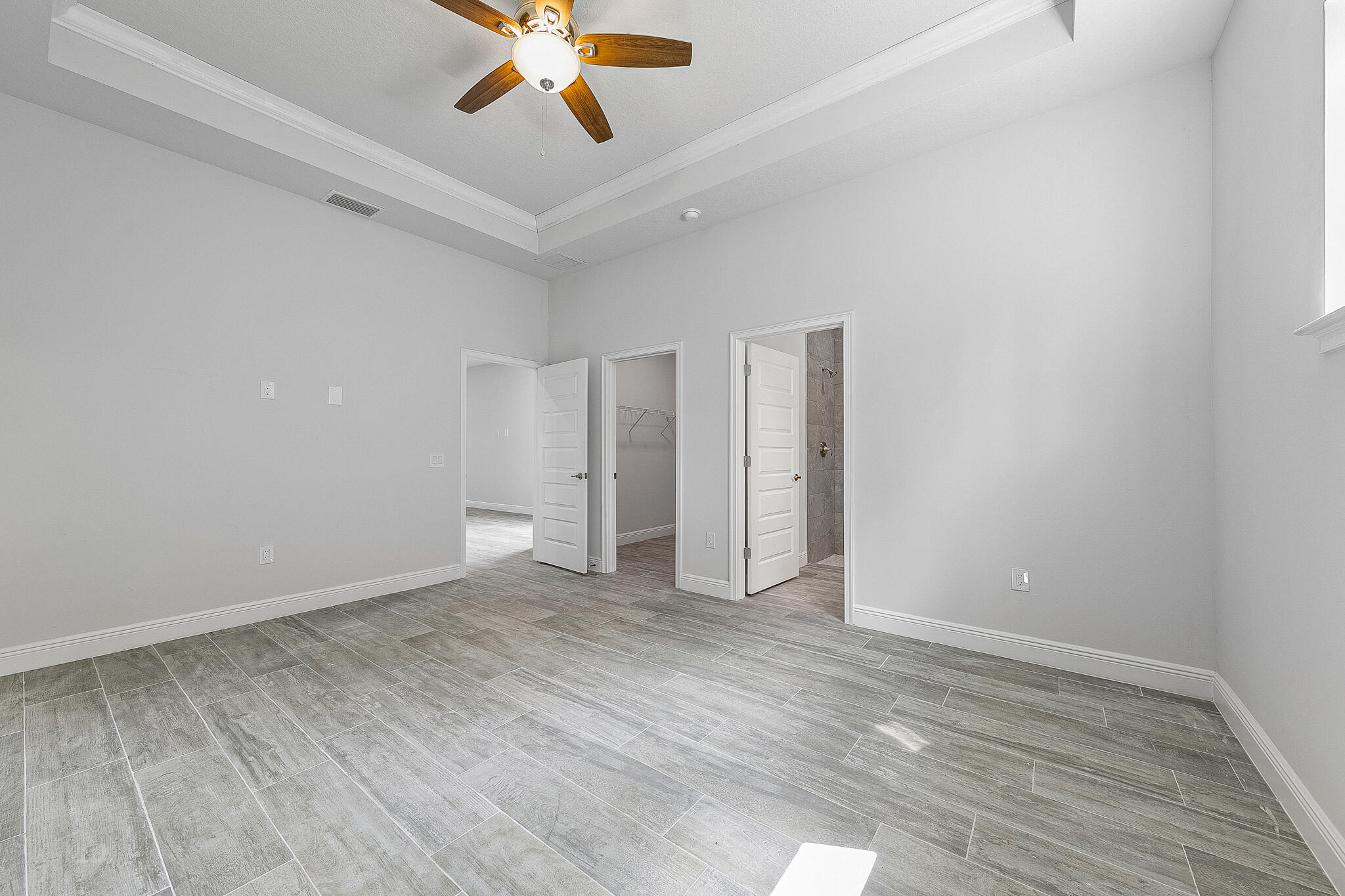3240 Aspen Road Southeast Palm Bay, FL 32909 - Photo 11 of 12 an empty room with closet and windows