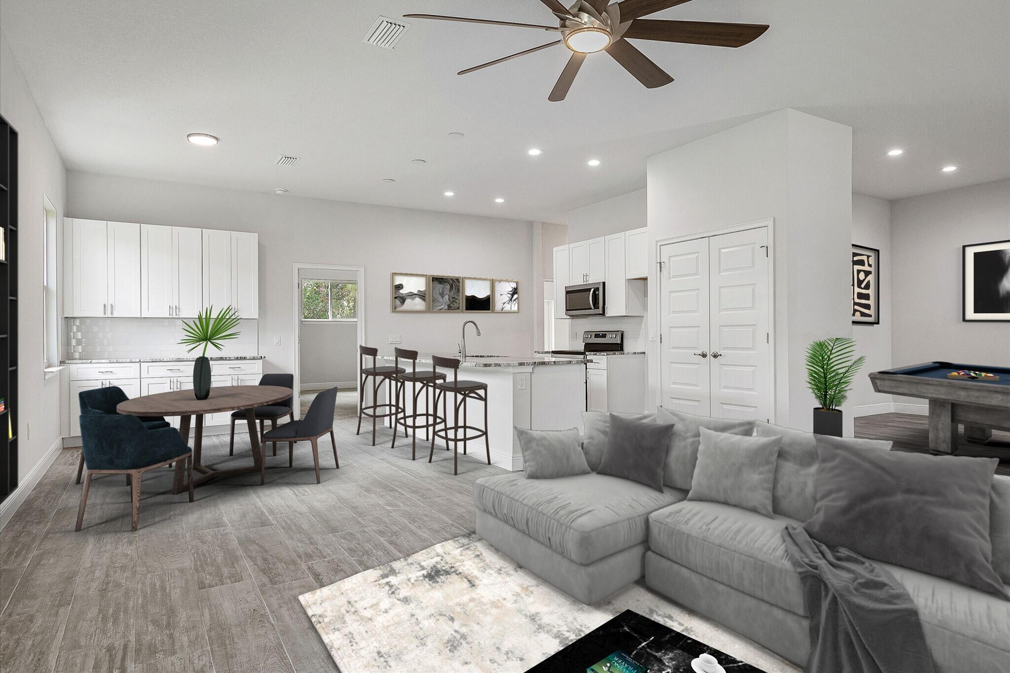 3240 Aspen Road Southeast Palm Bay, FL 32909 - Photo 3 of 12 a living room with furniture and a wooden floor