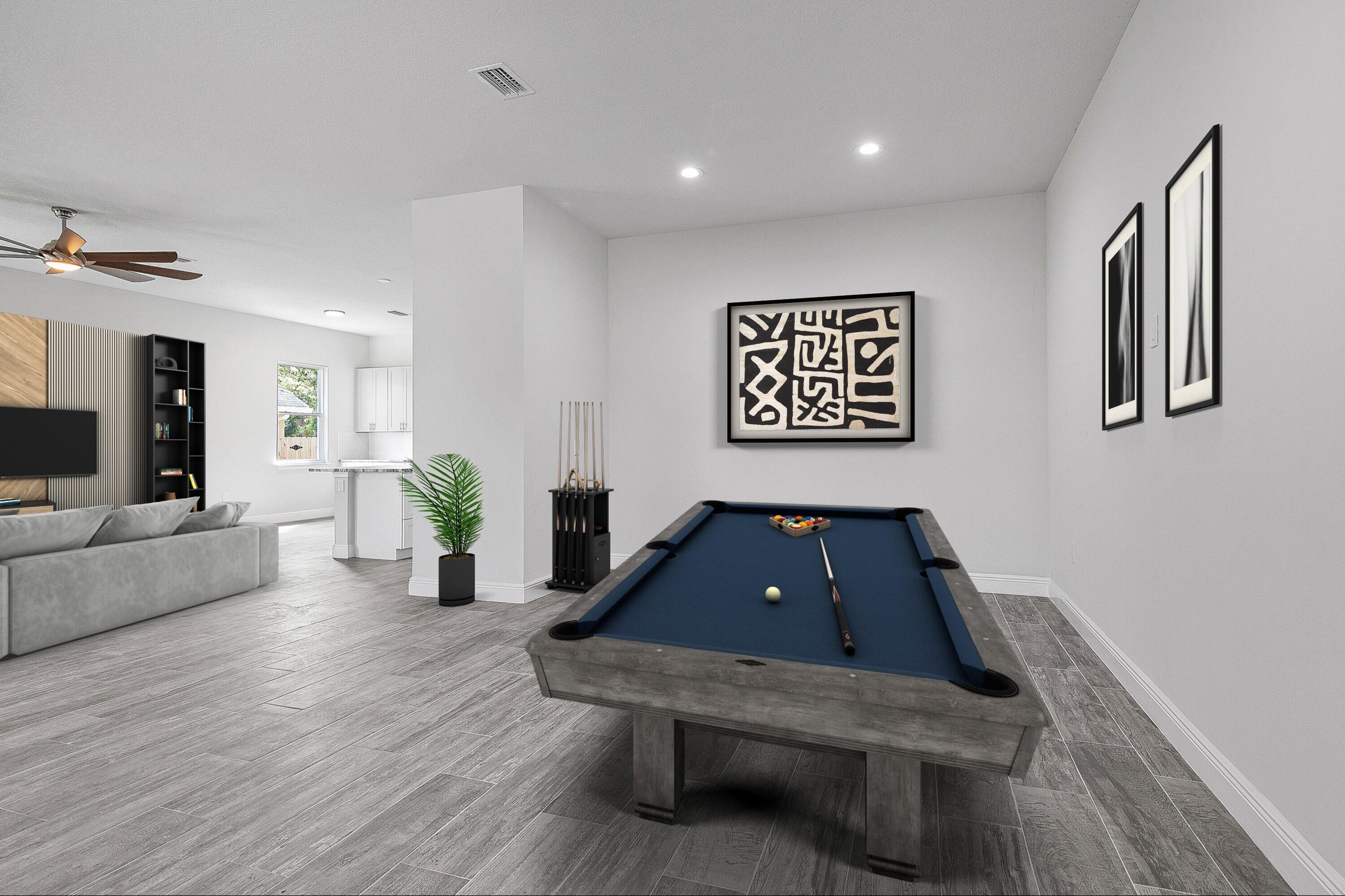 3240 Aspen Road Southeast Palm Bay, FL 32909 - Photo 5 of 12 a living room with furniture and a flat screen tv