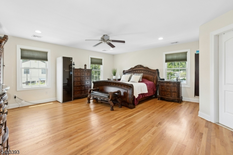 33 Stanton Street Clark, NJ 07066 - Photo 20 of 37 a bedroom with a bed and a chair