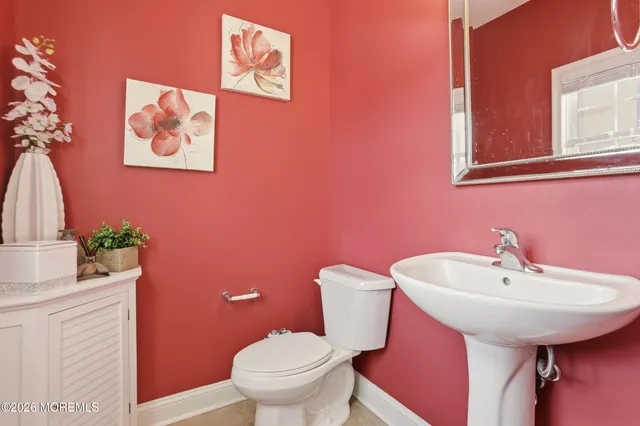 a bathroom with a sink a bathtub and a toilet