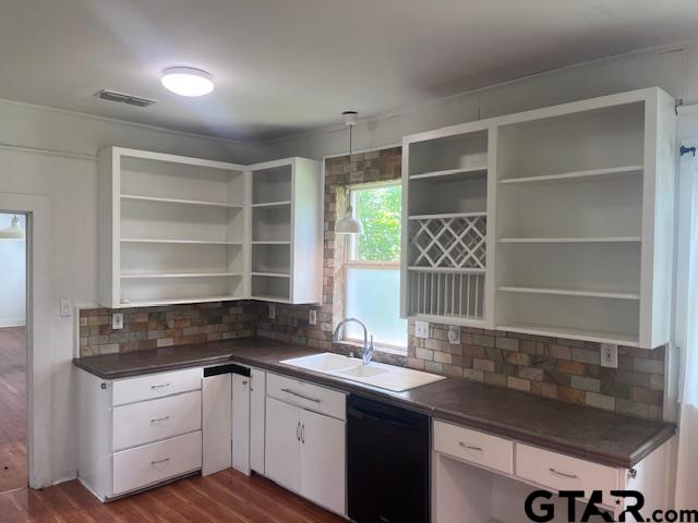 617 West Dobbs Street Tyler, TX 75701 - Photo 4 of 19 a kitchen with a sink and a window