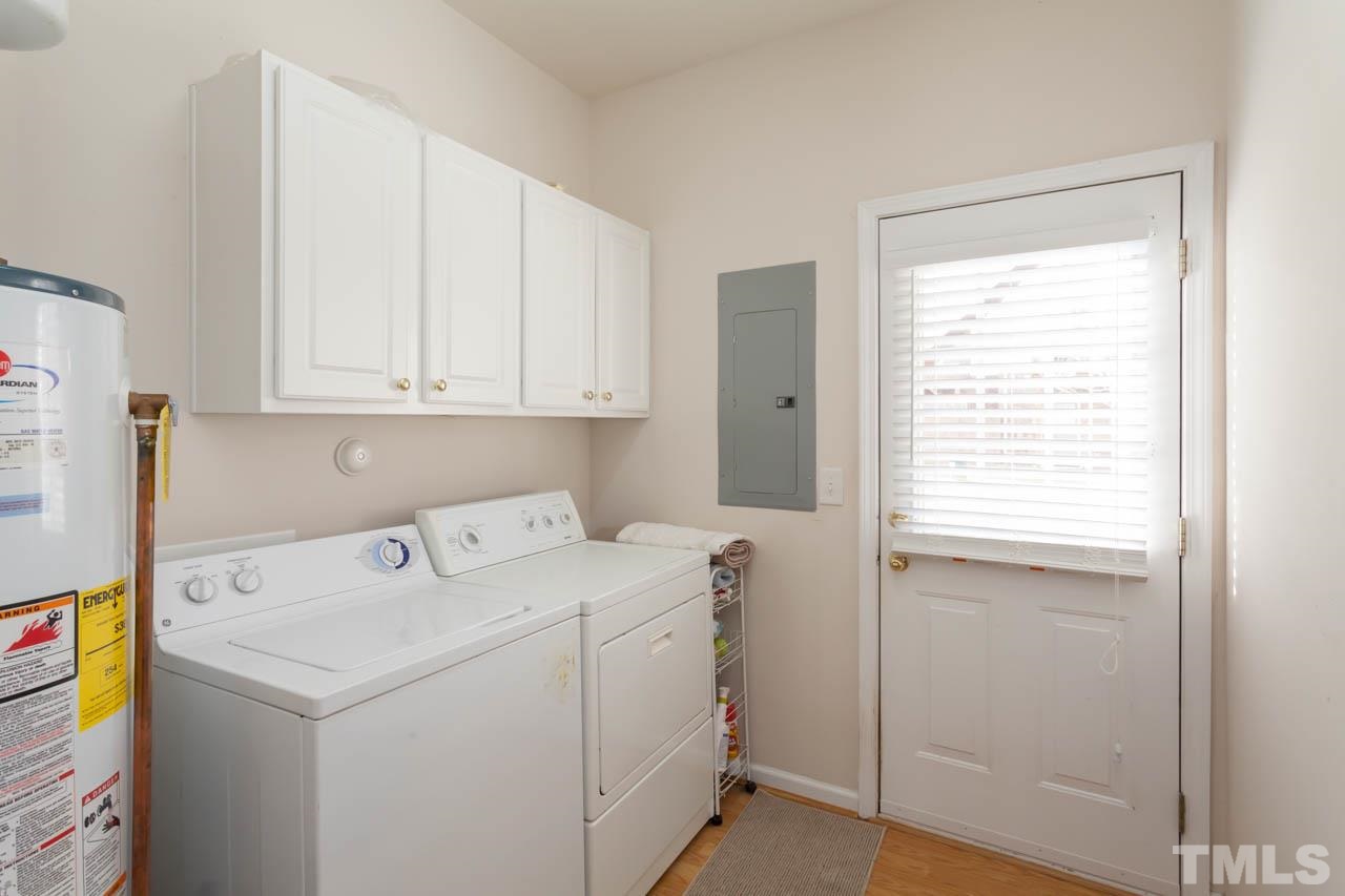 5541 Red Robin Road Raleigh, NC 27613 - Photo 18 of 23 a utility room with dryer and washer