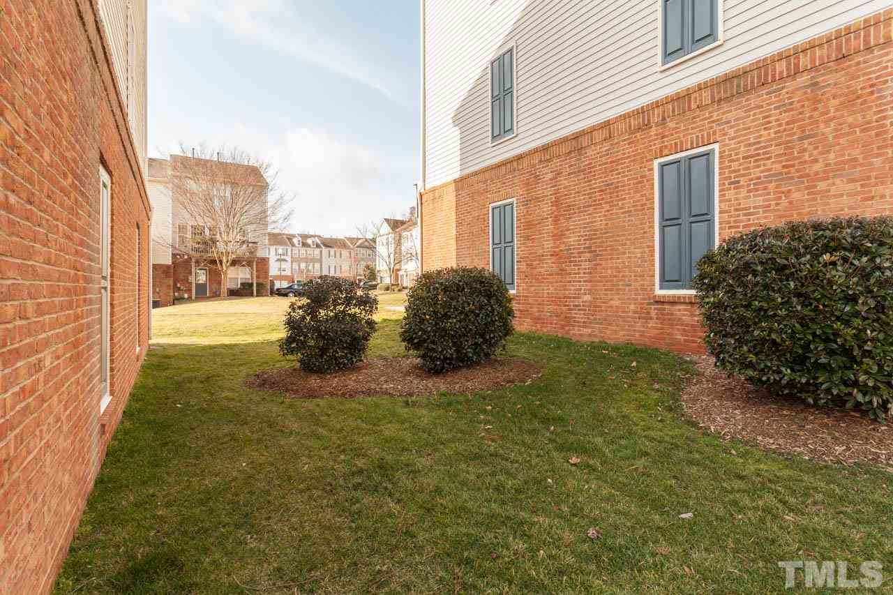 5541 Red Robin Road Raleigh, NC 27613 - Photo 22 of 23 a view of a back yard of the house
