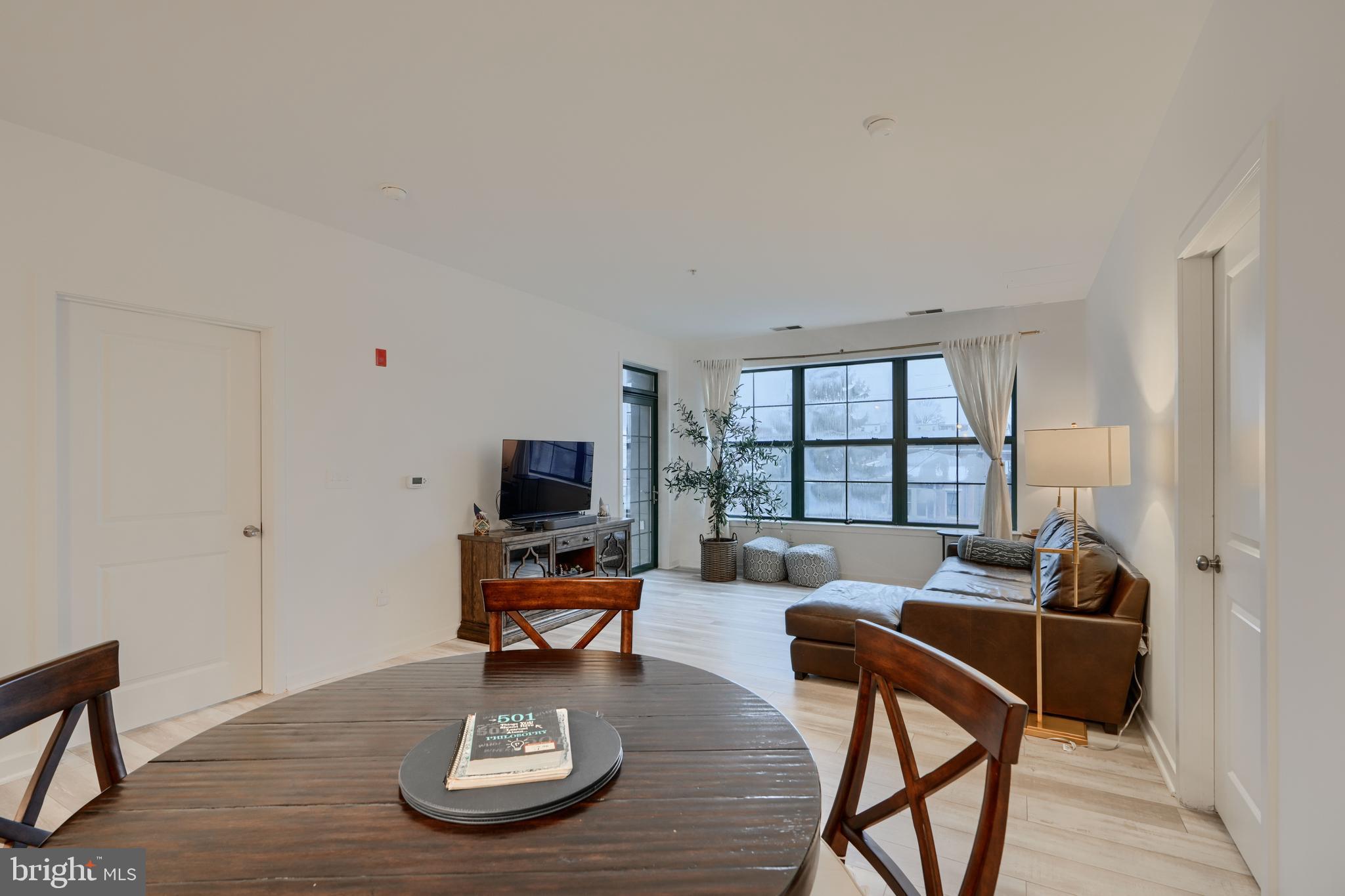 3201 St Paul Street, Unit 210 Baltimore, MD 21218 - Photo 12 of 38 a view of a workspace with furniture and a window