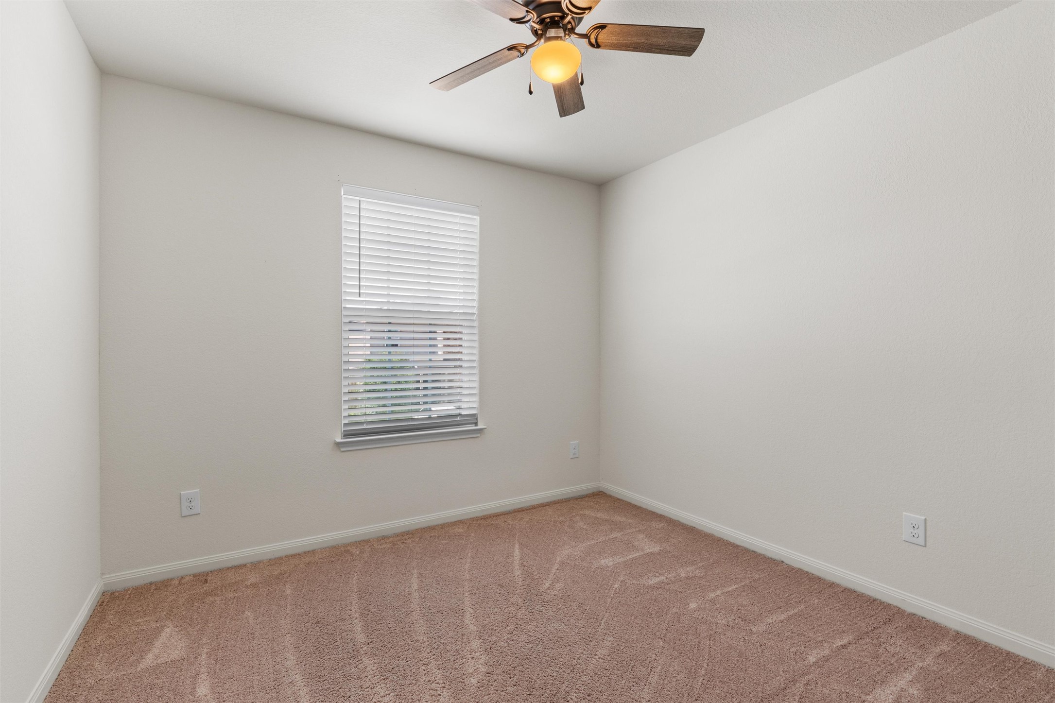 163 Niven Path, Unit 12K Jarrell, TX 76537 - Photo 22 of 31 an empty room with a window