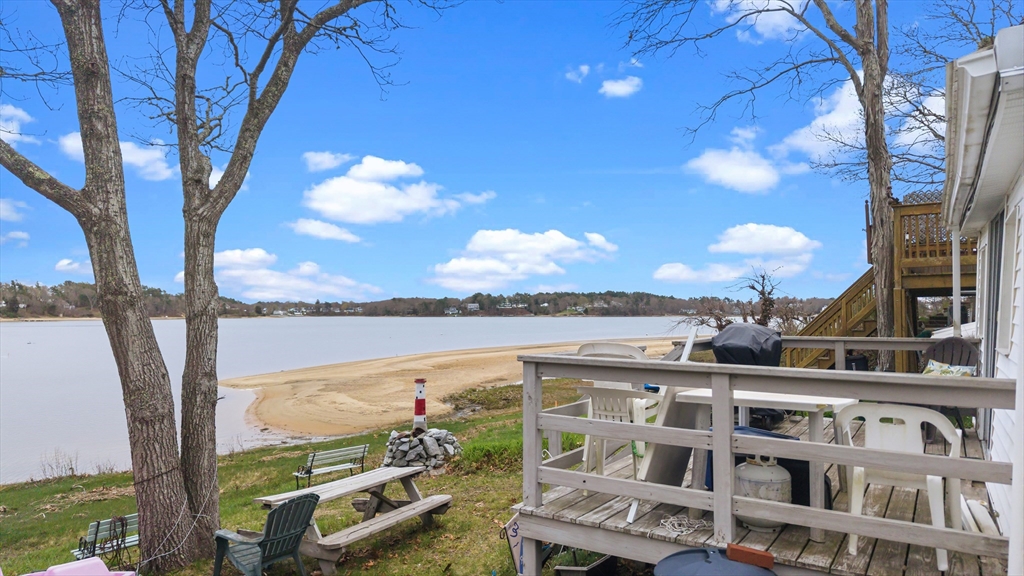 9 F Hideaway Road, Unit 11 Bourne, MA 02532 - Photo 13 of 24 a view of a lake from a balcony