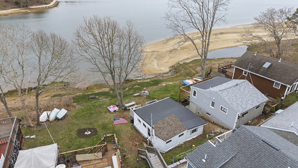 9 F Hideaway Road, Unit 11 Bourne, MA 02532 - Photo 19 of 24 an aerial view of houses with yard