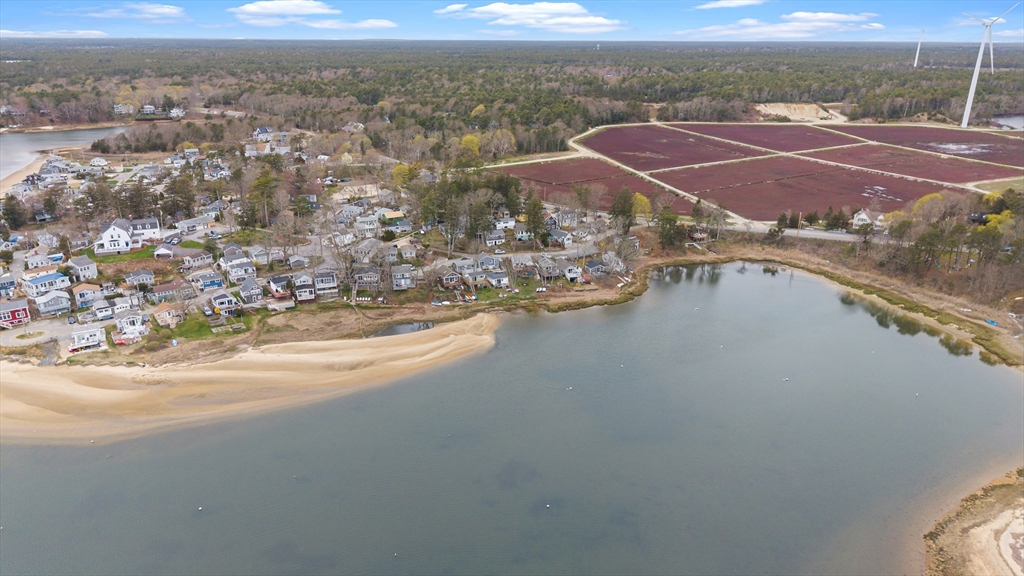 9 F Hideaway Road, Unit 11 Bourne, MA 02532 - Photo 22 of 24 an aerial view of residential houses with outdoor space and river