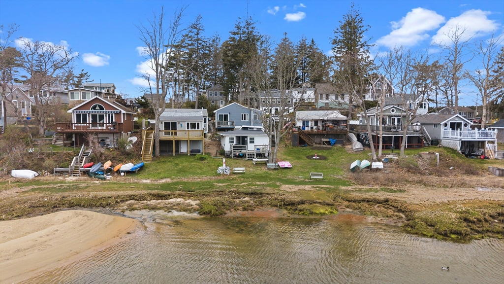 9 F Hideaway Road, Unit 11 Bourne, MA 02532 - Photo 24 of 24 a view of a town with many houses