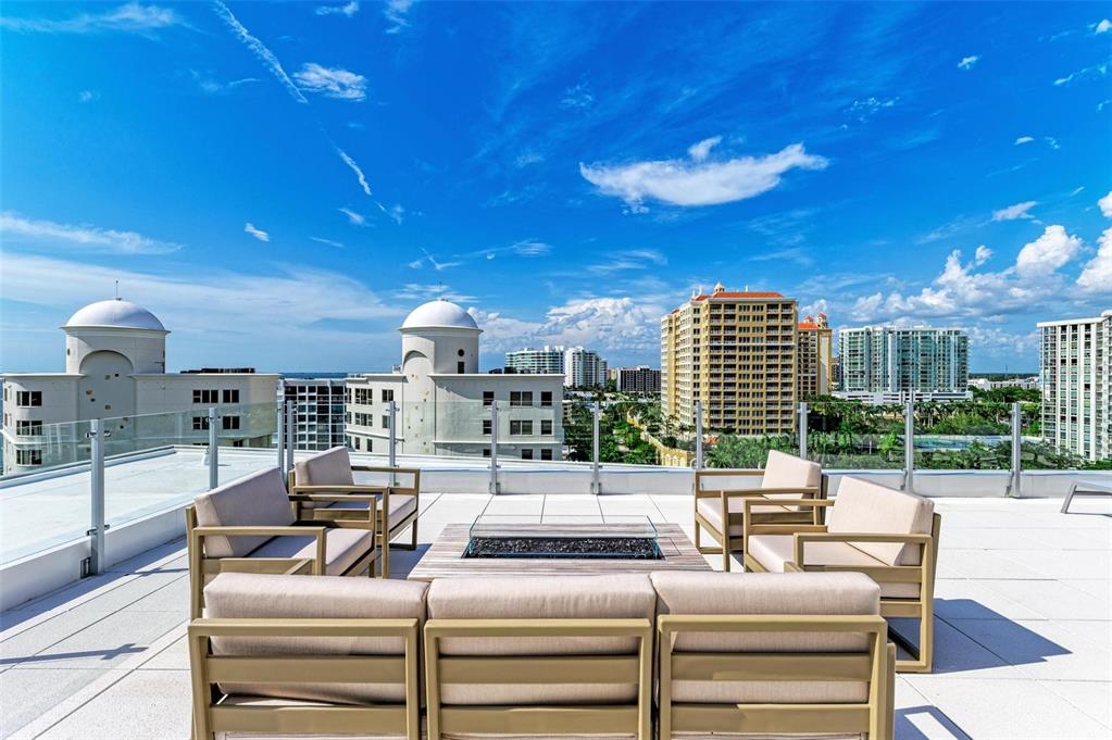 111 Golden Gate Point, Unit 402 Sarasota, FL 34236 - Photo 55 of 79 a outdoor living space with furniture and city view