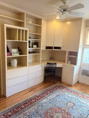 a room with a couch and a window